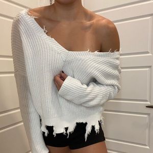 Distressed off the shoulders sweater